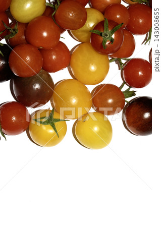 Mixed colour tomatoes on a white background plentiful harvest Mixed colour tomatoes on a white background plentiful harvest 143008655