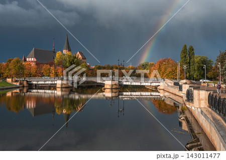 Autumn View of Konigsberg Cathedral and Rainbow in Kaliningrad. Russia Autumn View of Konigsberg Cathedral and Rainbow in Kaliningrad. Russia 143011477