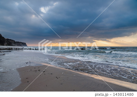 Donskoye beach at sunset of Baltic Sea. Kaliningrad region, Russia Donskoye beach at sunset of Baltic Sea. Kaliningrad region, Russia 143011480