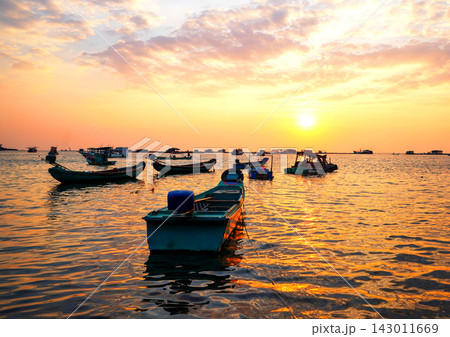 Long-tail boat moored at coastline of South Asia, used by local fishermen. Coast of Phu Quoc Island 143011669