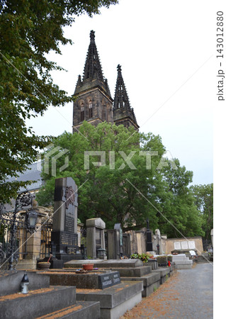 Vysehrad cemetery graves and monuments with basilica spires in prague for memorial background and cultural travel imagery 143012880