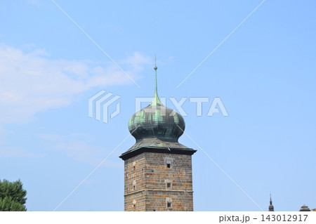Sitkov water tower stone tower with green copper onion dome against blue sky for prague travel background and architecture poster 143012917