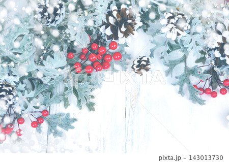 Christmas wooden background with snow branch. Top view with copy space for your text Christmas wooden background with snow branch. Top view with copy space for your text 143013730