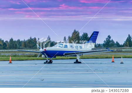 Private turboprop aircraft at the airport in the morning light 143017280