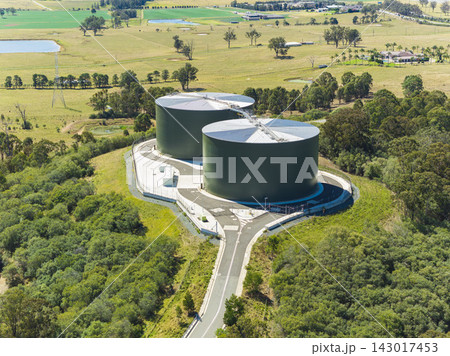 Aerial view of large water tanks in the Western Sydney suburb of Oran Park 143017453