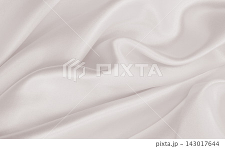Smooth elegant golden silk or satin luxury cloth texture as wedding background. Luxurious background design. In Sepia toned. Retro style Smooth elegant golden silk or satin luxury cloth texture as wedding background. Luxurious background design. In Sepia toned. Retro style 143017644