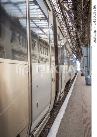 High-speed train stop on the platform of the railway station in Lviv. Ukraine High-speed train stop on the platform of the railway station in Lviv. Ukraine 143019266