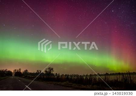 The northern lights above the road The northern lights above the road 143019330