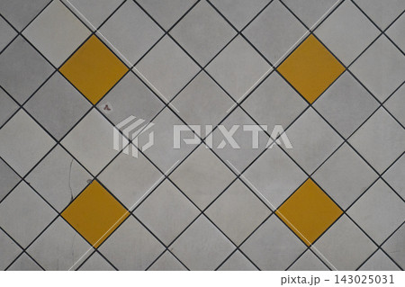 Diagonal grid tile pattern with yellow accent tiles background 143025031