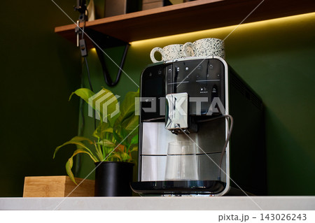 Automatic coffee machine in modern home coffee corner Automatic coffee machine in modern home coffee corner 143026243
