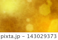 ゴールドと光ボケの背景テクスチャ 143029373