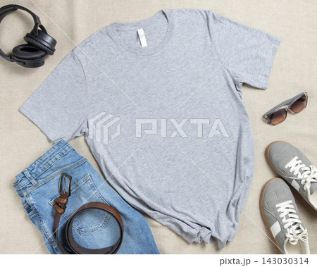 Blank heather grey unisex t-shirt mockup, crewneck flat lay with denim jeans and mens accessories Blank heather grey unisex t-shirt mockup, crewneck flat lay with denim jeans and mens accessories 143030314