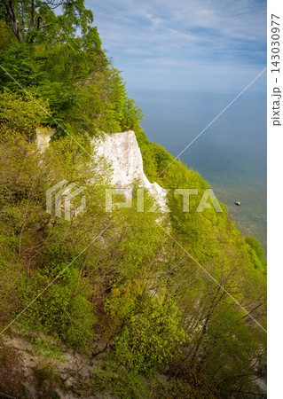 View of famous white chalk cliffs and Baltic Sea from suspension bridge in Jasmund National Park on Ruegen island, Germany 143030977