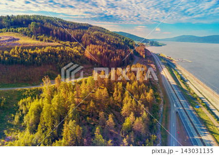 Aerial view of the beautiful Lake Mjosa and the highway. Norway Aerial view of the beautiful Lake Mjosa and the highway. Norway 143031135
