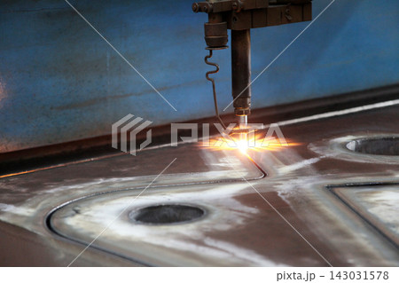 CNC Laser cutting of metal, modern industrial technology. 143031578