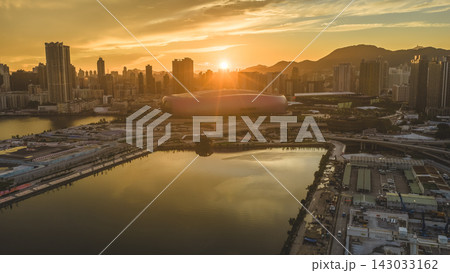 Hong Kong, July 10 2026 Golden Sunset Above Kai Tak Sports Park Skyline Hong Kong, July 10 2026 Golden Sunset Above Kai Tak Sports Park Skyline 143033162