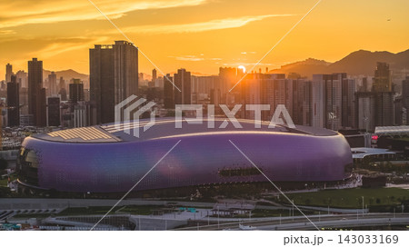 Hong Kong, July 10 2026 Kai Tak Sports Park Glowing Beneath Golden Sunset Hong Kong, July 10 2026 Kai Tak Sports Park Glowing Beneath Golden Sunset 143033169