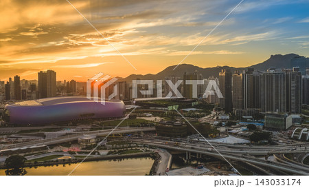 Hong Kong, July 10 2026 Golden Sunset Above Kai Tak Sports Park Skyline Hong Kong, July 10 2026 Golden Sunset Above Kai Tak Sports Park Skyline 143033174