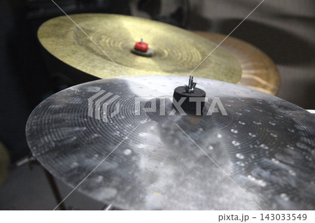 Drums are set up in a music studio with microphones attached. The scene shows toms ready Drums are set up in a music studio with microphones attached. The scene shows toms ready 143033549