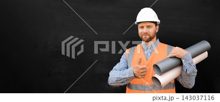 Male Engineer in a White Hard Hats, Orange West. Handsome Confident Build Worker with Blueprints Isolated on Blank Black Background. Copy Space. Industry Manufacturing Factory. Mechanic Service Work Male Engineer in a White Hard Hats, Orange West. Handsome Confident Build Worker with Blueprints Isolated on Blank Black Background. Copy Space. Industry Manufacturing Factory. Mechanic Service Work 143037116