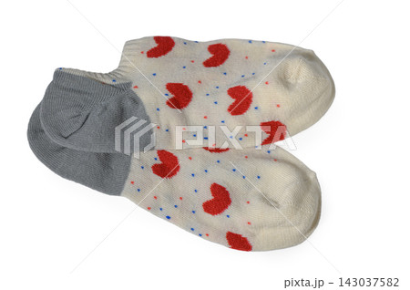 Pair of white ankle socks with red hearts and grey heels isolated on white Pair of white ankle socks with red hearts and grey heels isolated on white 143037582