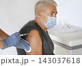 Doctor Vaccinating Senior Man In Clinic. Older People Vaccination. Doctor Giving Monkeypox or COVID Vaccine Injection to Mature Man In Face Mask. Protection of Elderly Patient. Old Man in Hospital 143037618