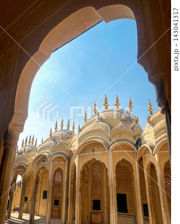 A row of beautiful domes and arches of the palace complex in Jaipur, India. A row of beautiful domes and arches of the palace complex in Jaipur, India. 143041317