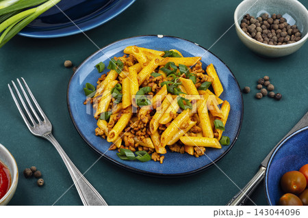 Classic pasta with minced meat and green onions Classic pasta with minced meat and green onions 143044096