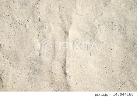 Texture background of a clean light beige plaster concrete wall surface 143044169