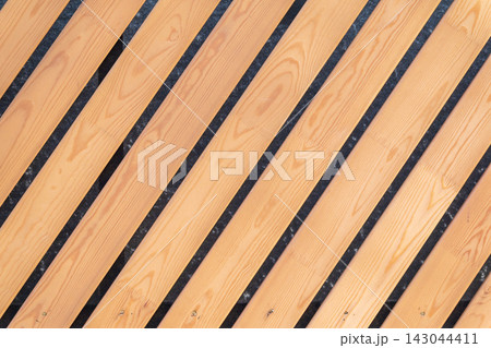 Background of diagonal slanted wooden planks Background of diagonal slanted wooden planks 143044411
