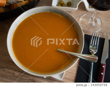 Traditional Spanish soup with seafood in a bowl view from above 143050738