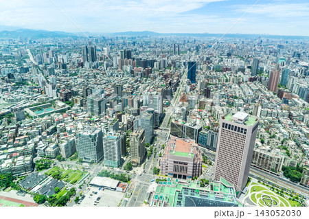 Panoramic aerial view of cityscape, skyline and urban sprawl of Taipei in Taiwan under sun, bright blue sky Panoramic aerial view of cityscape, skyline and urban sprawl of Taipei in Taiwan under sun, bright blue sky 143052030