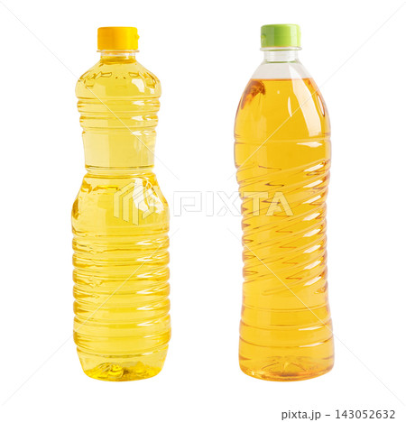 Vegetable oil in plastic bottle isolated on white background. Vegetable oil in plastic bottle isolated on white background. 143052632
