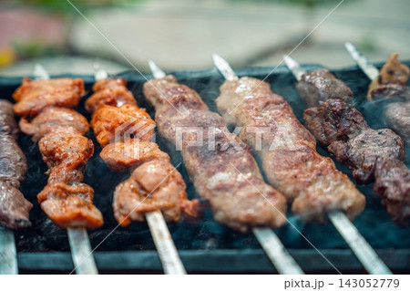 Grilled Meat Skewers on Barbecue 143052779