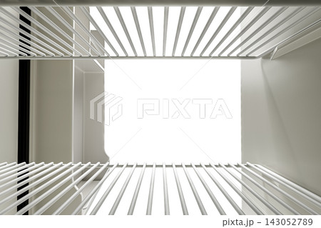 Vew from the inside of refrigerator with an open door Vew from the inside of refrigerator with an open door 143052789