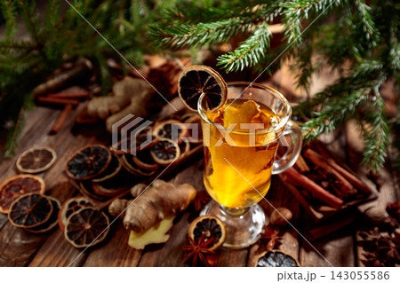 Ginger tea with spices and fir branches. Ginger tea with spices and fir branches. 143055586