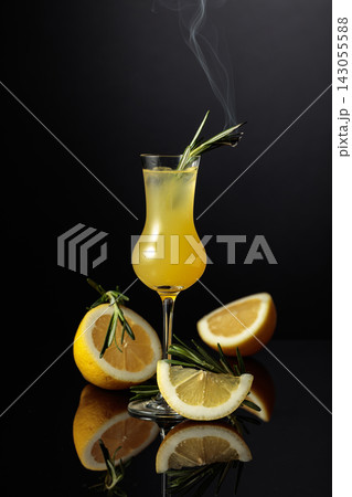 Traditional homemade lemon liqueur limoncello on the black background. 143055588