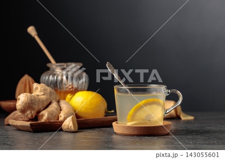 Ginger tea with lemon and honey. 143055601