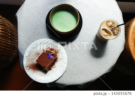 tiramisu or cake or cocoa cake or coffee cake , matcha green tea latte and iced coffee tiramisu or cake or cocoa cake or coffee cake , matcha green tea latte and iced coffee 143055876