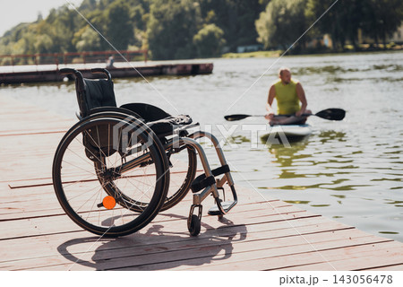 Person with a physical disability ride on sup board 143056478