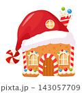 a cute gingerbread house with a roof shaped like Santa's hat 143057709