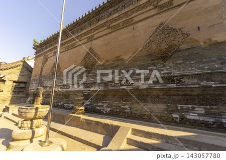 Xi'an, China - Dec 31, 2024 : View of Great Mosque of Xi'an with blue sky in Xi'an, China in Dec 31, 2024. Xi'an, China - Dec 31, 2024 : View of Great Mosque of Xi'an with blue sky in Xi'an, China in Dec 31, 2024. 143057780