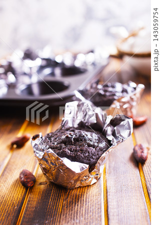 Chocolate chip muffins mini size on a board, double chocolate muffins, Chocolate chip muffins mini size on a board, double chocolate muffins, 143059754