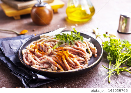 minced meat on black plate minced meat on black plate 143059766