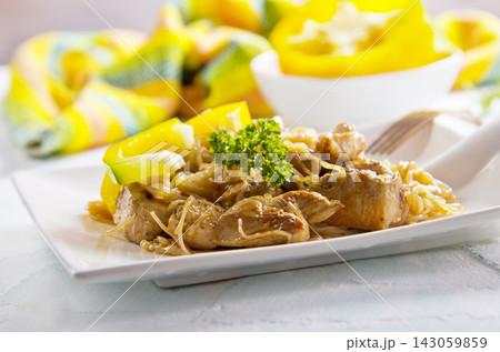 pasta with chicken and sauce on plate 143059859