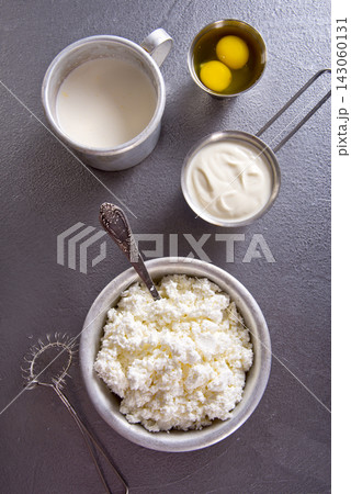 Cream cheese and milk and fresh eggs 143060131
