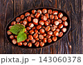 Close up view of hazelnuts on a table 143060378