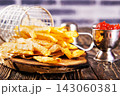 Crisp golden brown curly fried potato 143060381