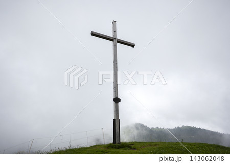 Summit cross Mittleres Hornle mountain in Bavaria, Germany 143062048