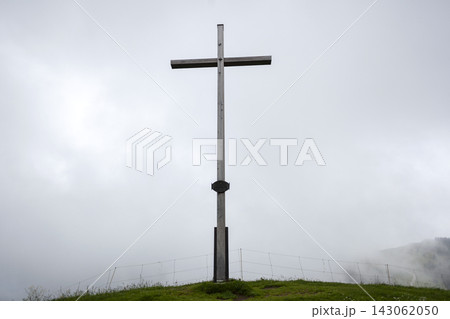 Summit cross Mittleres Hornle mountain in Bavaria, Germany 143062050